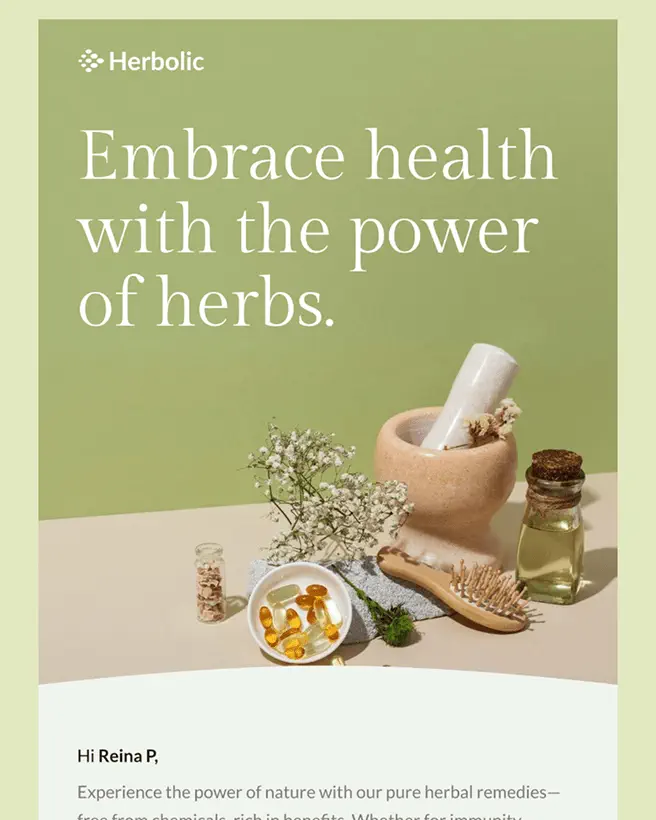 Stone mortar with dried flowers, a bottle of oil and a wooden brush