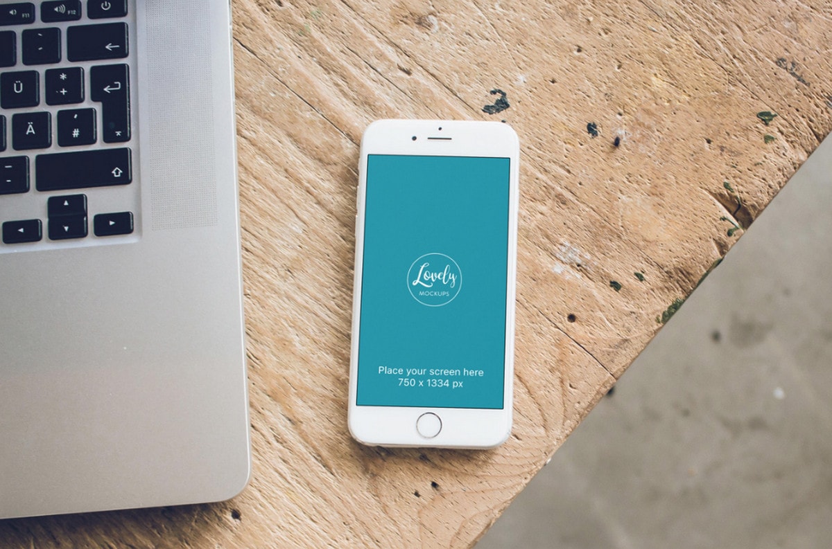 White iPhone Mockup on Carpenter Desk