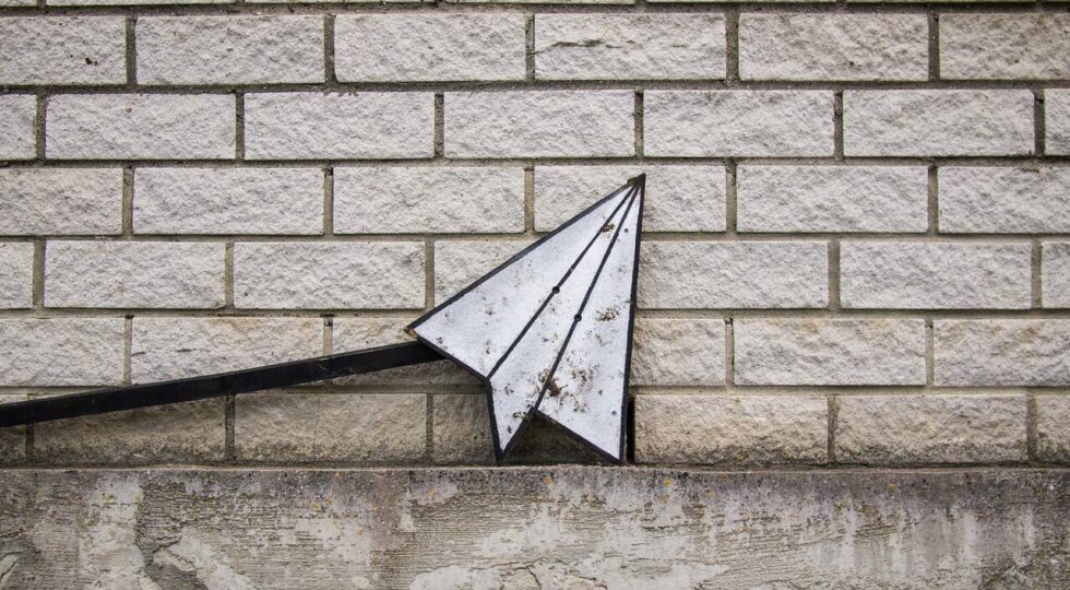 email icon graphic on a wall